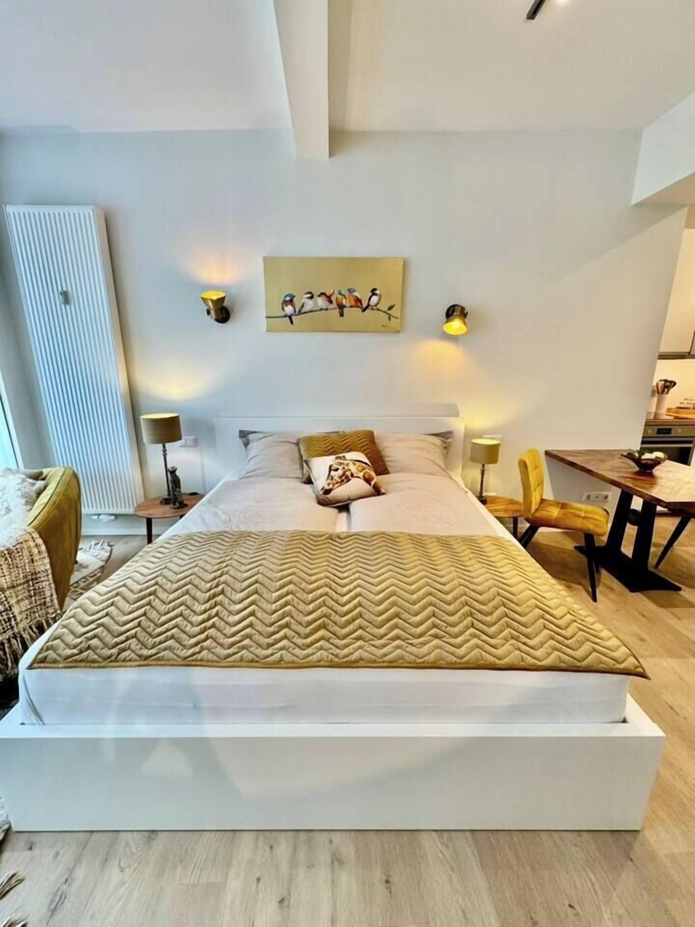 1 habitación, tabla de planchar con plancha, cuna de viaje y wifi 