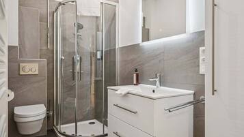 Shower, hair dryer, shampoo