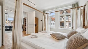 1 slaapkamer, een strijkplank/strijkijzer, wifi, beddengoed