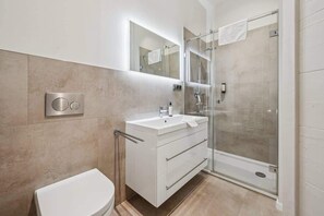Shower, hair dryer, shampoo