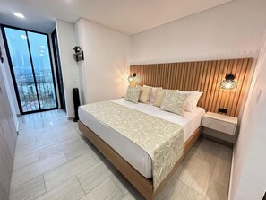1 habitación, tabla de planchar con plancha y ropa de cama