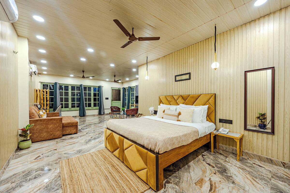 Suite Studio Premium, vue jardin | Literie de qualité supérieure, décoration personnalisée