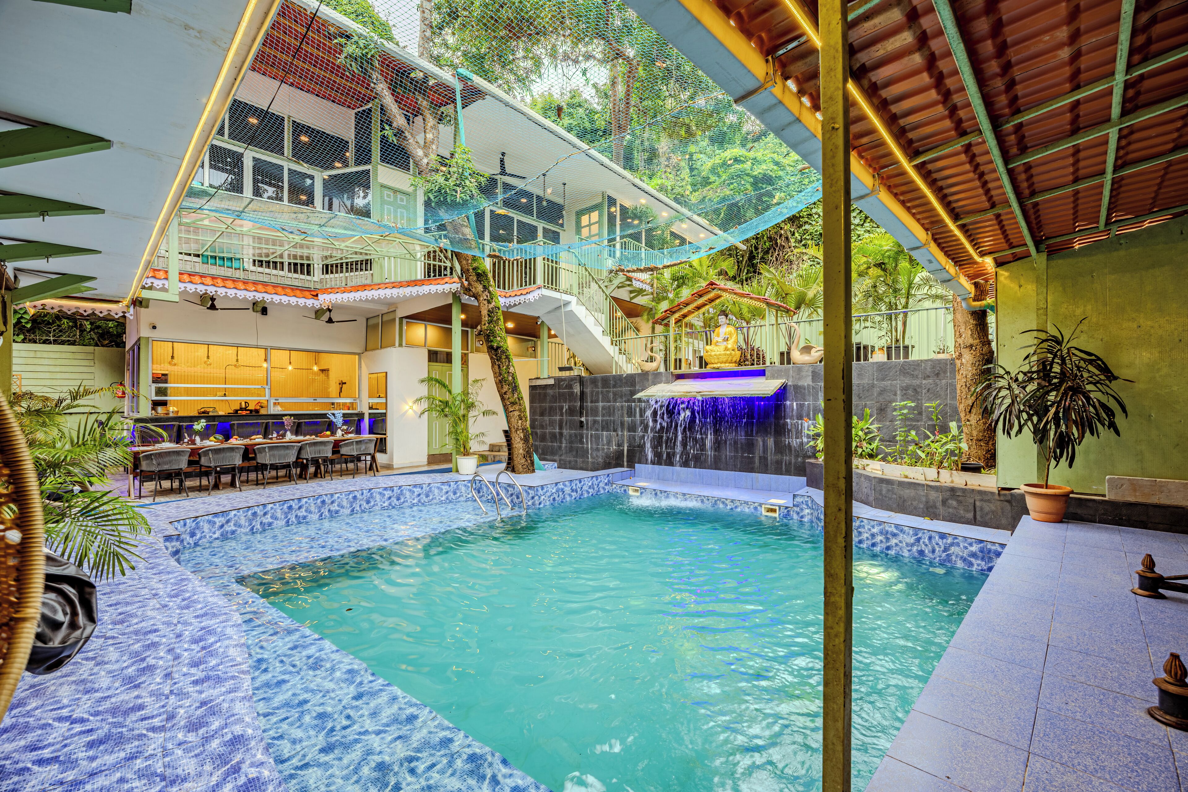 Outdoor pool, open 1:00 PM to 9:30 PM, pool umbrellas, pool loungers