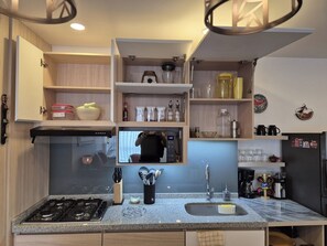 Microwave, coffee/tea maker, cookware/dishes/utensils