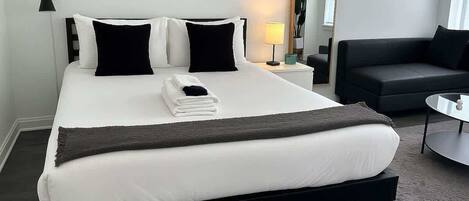 Iron/ironing board, travel crib, WiFi, bed sheets