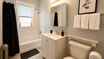 Shower, hair dryer, towels