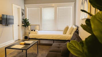 Iron/ironing board, travel crib, WiFi, bed sheets
