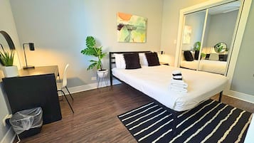 1 bedroom, desk, iron/ironing board, travel crib