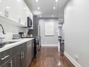 Fridge, microwave, oven, stovetop - Cozy 2BR with King Beds + Full Kitchen (Chicago)