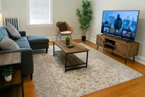 TV, offices - Cozy Cragin 2BR Apartment Near Logan Square (Chicago)