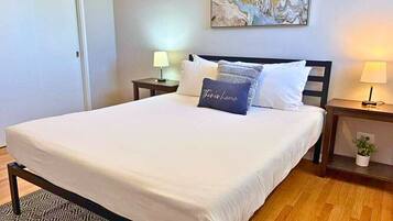 1 bedroom, desk, iron/ironing board, travel crib