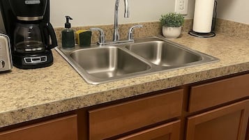 Fridge, microwave, stovetop, coffee/tea maker