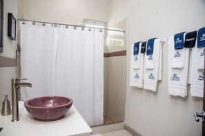 Hair dryer, towels, soap, shampoo