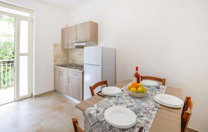 Fridge, stovetop, cookware/dishes/utensils