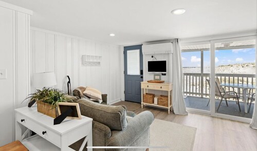 On the Beach-Dog Friendly 2BR Condo walk to the waves.