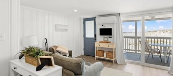 On the Beach-Dog Friendly 2BR Condo walk to the waves.