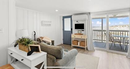 On the Beach-Dog Friendly 2BR Condo walk to the waves.