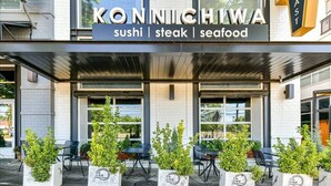 A restaurant named KONNICHIWA offering sushi, steak, and seafood.