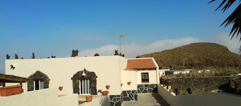 Holiday Home 'Aguarijo' with Sea View, Private Terrace and Private Garden