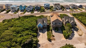 A coastal residential area with houses, a road, and a beach. - Clean & Updated Just Steps from the Beach. Dogs Welcome. Grill & Beach Gear (Surf City)
