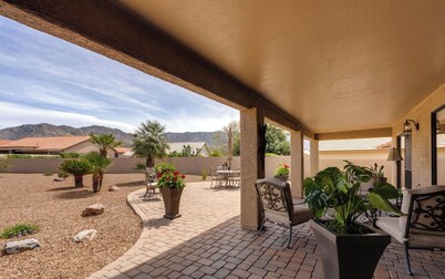 Charming 2-bedroom 2 bath home in Saddlebrooke one with private back yard.