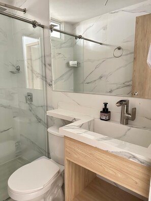 Hair dryer, towels, soap, shampoo