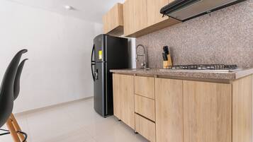 Fridge, microwave, stovetop, coffee/tea maker