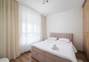 1 slaapkamer, een strijkplank/strijkijzer, wifi, beddengoed