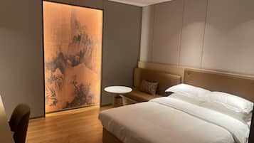 Premium bedding, desk, laptop workspace, free WiFi