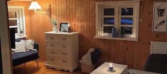 A cozy older summerhouse on a small island