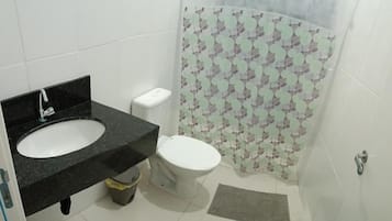Shower, towels, toilet paper