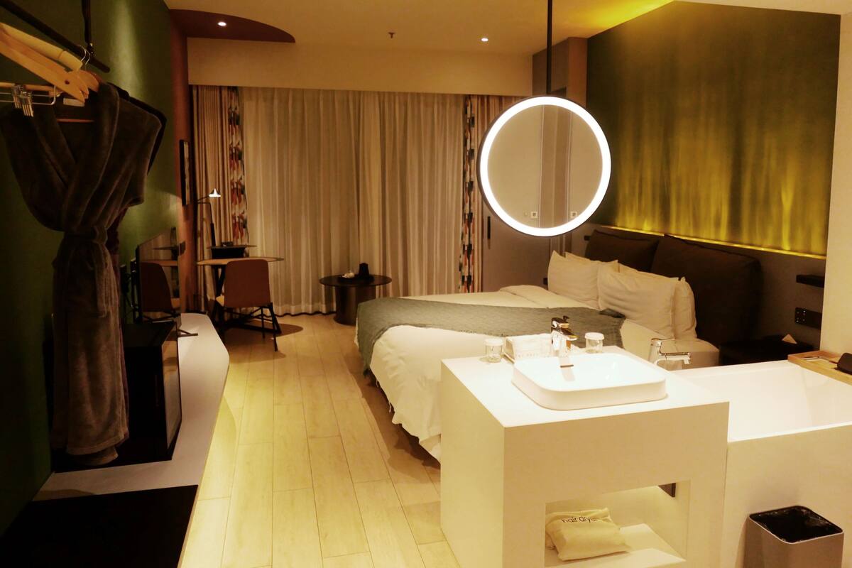 Family Quadruple Room, 2 Bedrooms | In-room safe, blackout drapes, soundproofing, iron/ironing board