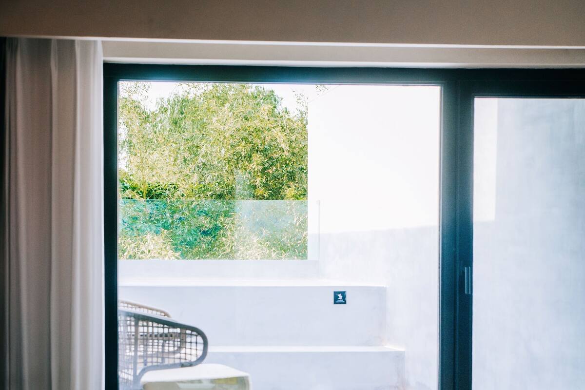 Signature Double Room, Courtyard View | 1 bedroom, in-room safe, blackout drapes, iron/ironing board