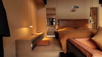 Desk, laptop workspace, blackout drapes, iron/ironing board