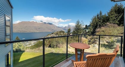 Modern Alpine Retreat with Mountain and Lake View