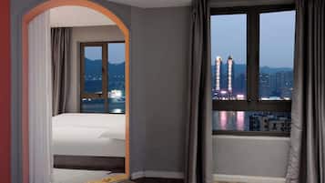 Superior Suite, City View | Premium bedding, down comforters, individually decorated