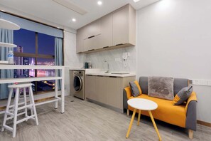 Elite-Doppelzimmer, Stadtblick | Wohnzimmer