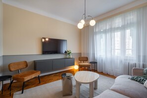Luxury Apartment, 3 Bedrooms, Balcony | Living area | 49-inch flat-screen TV with digital channels, Netflix