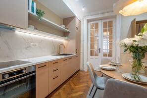 Luxury Apartment, 3 Bedrooms, Balcony | Living area | 49-inch flat-screen TV with digital channels, Netflix