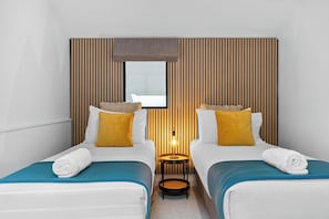 3 habitaciones, tabla de planchar con plancha, wifi y ropa de cama