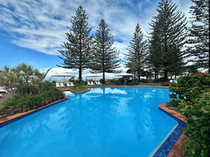 3 outdoor pools, pool umbrellas, sun loungers - Nautilus Beach Resort by Charlesworth (Coffs Harbour)