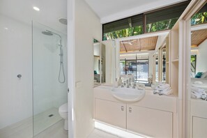 Shower, hair dryer, towels, soap