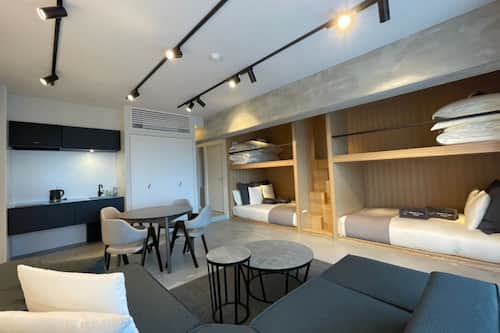 Family Suite Max 8 Comfort 4 with Sauna, Non Smoking | Desk, laptop workspace, blackout drapes, free WiFi
