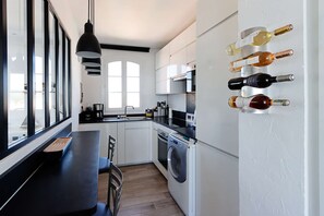 Réfrigérateur, micro-ondes, four, lave-vaisselle