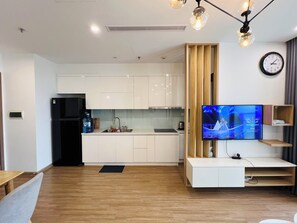 Deluxe Apartment, 2 Bedrooms, Air conditioning, City View | Living area | Flat-screen TV - Vinhomes Skylake (Hanoi)