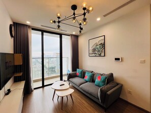 Deluxe Apartment, 2 Bedrooms, Air conditioning, City View | Living area | Flat-screen TV - Vinhomes Skylake (Hanoi)