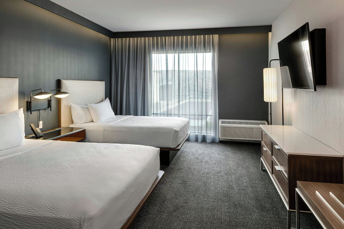 Habitació, diversos llits | Cortines opaques, planxa i posts de planxar i wifi gratuïta