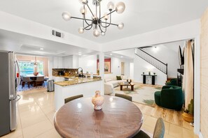 Smart TV, fireplace, foosball, books