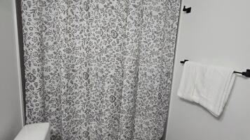 Hair dryer, towels, soap, shampoo
