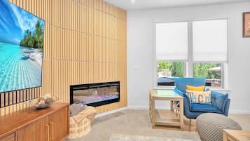 Smart TV, fireplace, video games, foosball